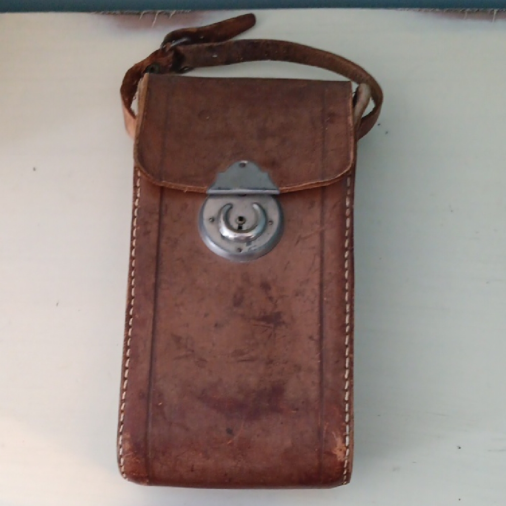 + Vintage Brown Leather Hand/Wrist Bag